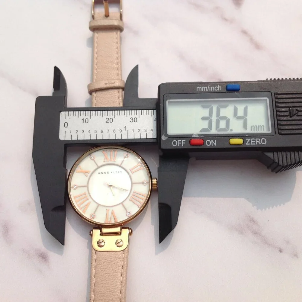 Anne Klein Quartz Wrist Watch MOP Face and Rose Gold & Arabic Numerals